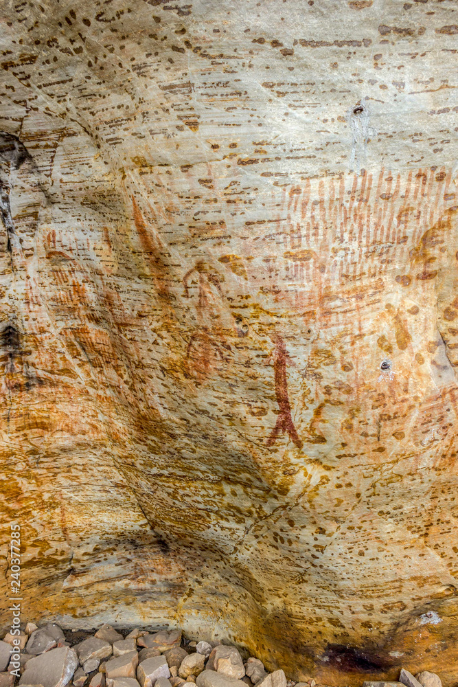 Naklejka premium Ancient Aboriginal Art: hand prints, animal herds, spiral, australia