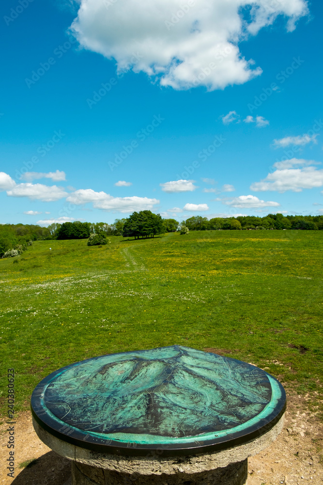 Looking back from the toposcope at Standish Woods on the Cotswold Way long distance footpath near Stroud, Gloucestershire, Cotswolds, England, UK