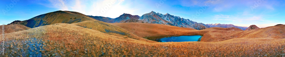 panorama of the lake high in the mountains in the fall at sunset panorama of the lake high in the mountains in the fall at sunset