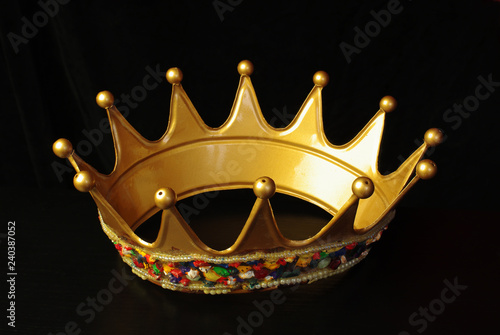 Golden crown on a black background