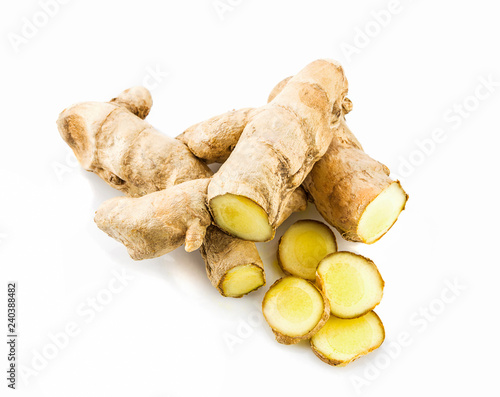 white termeric root and slice isolated on white background photo