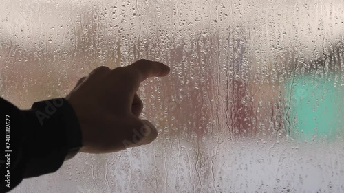 Wallpaper Mural A man's hand draws a question mark on a misted glass.Close up. Torontodigital.ca