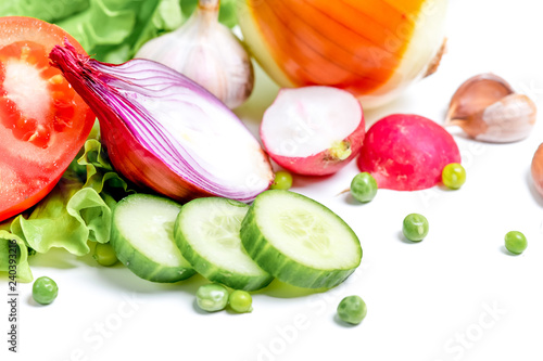 a fresh group of vegetables on white background