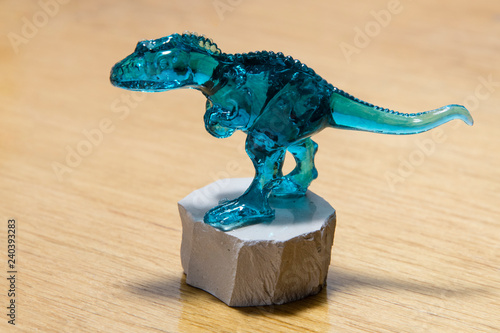 Glass figurine dinosaur.