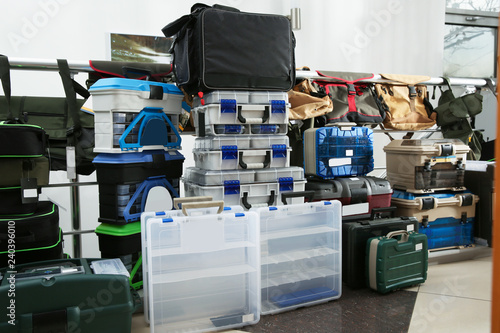 Boxes for fishing equipment in sports shop