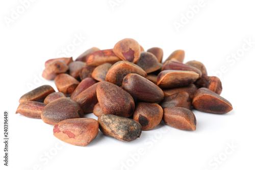 Heap of pine nuts on white background. Healthy snack