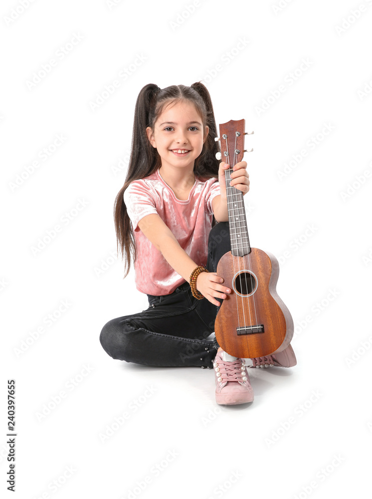 Little cheerful girl with guitar, isolated on white Little cheerful girl with guitar, isolated on white