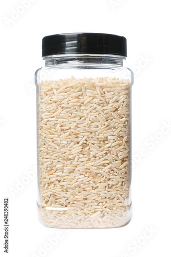 Brown rice in jar, isolated on white. Mock up for design