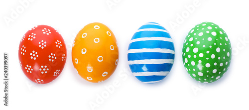 Decorated Easter eggs on white background, top view. Festive tradition