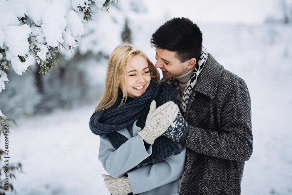 Love story in the winter forest. Valentine's Day concept