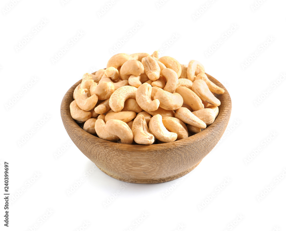Tasty cashew nuts in bowl isolated on white Tasty cashew nuts in bowl isolated on white