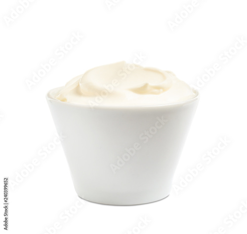 Ceramic bowl with fresh sour cream isolated on white
