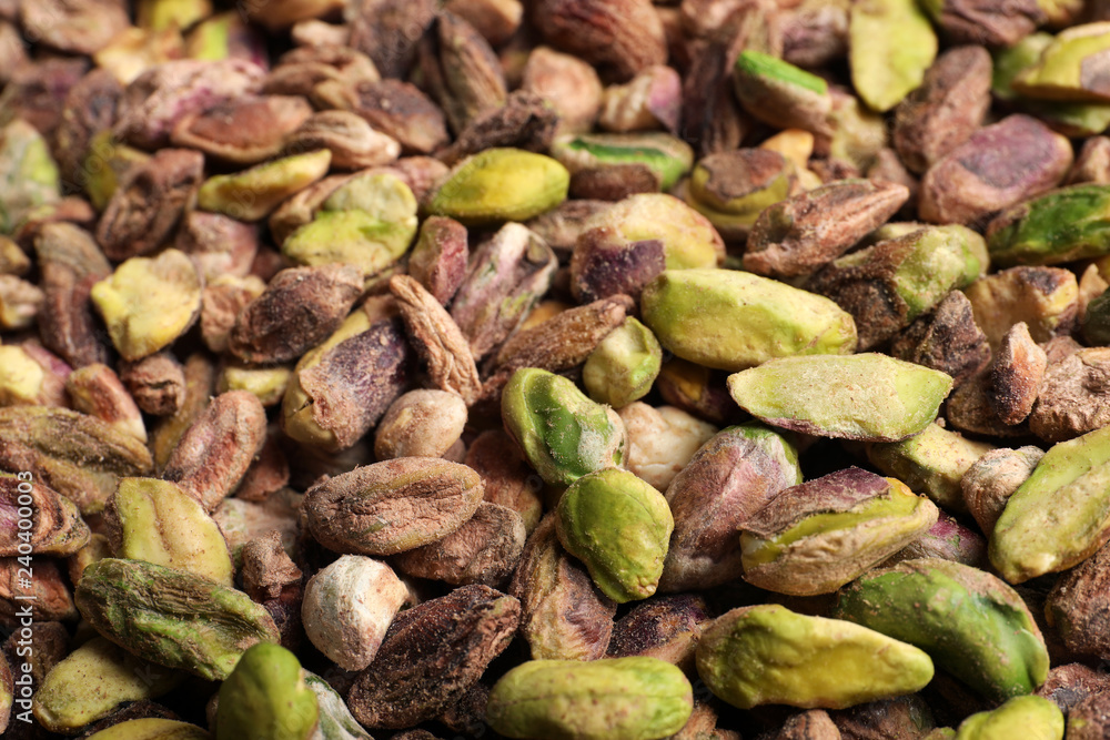 Shelled organic pistachio nuts as background, closeup Shelled organic pistachio nuts as background, closeup