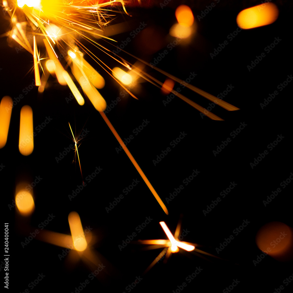Christmas sparkler isolated on black background. Bengal fire Christmas sparkler isolated on black background. Bengal fire