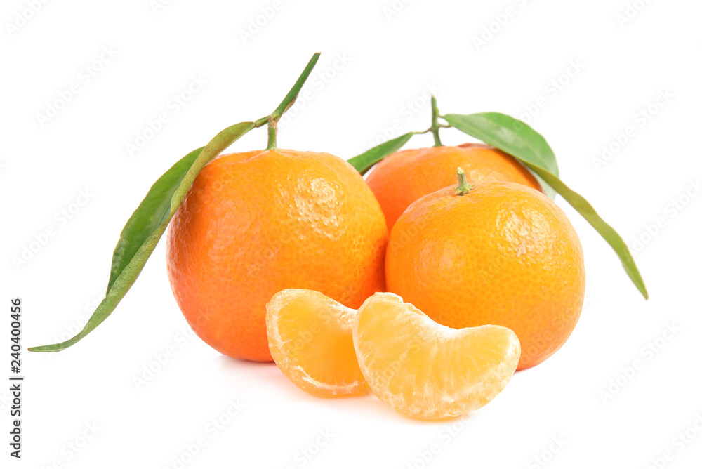 Tasty ripe tangerines with leaves on white background Tasty ripe tangerines with leaves on white background