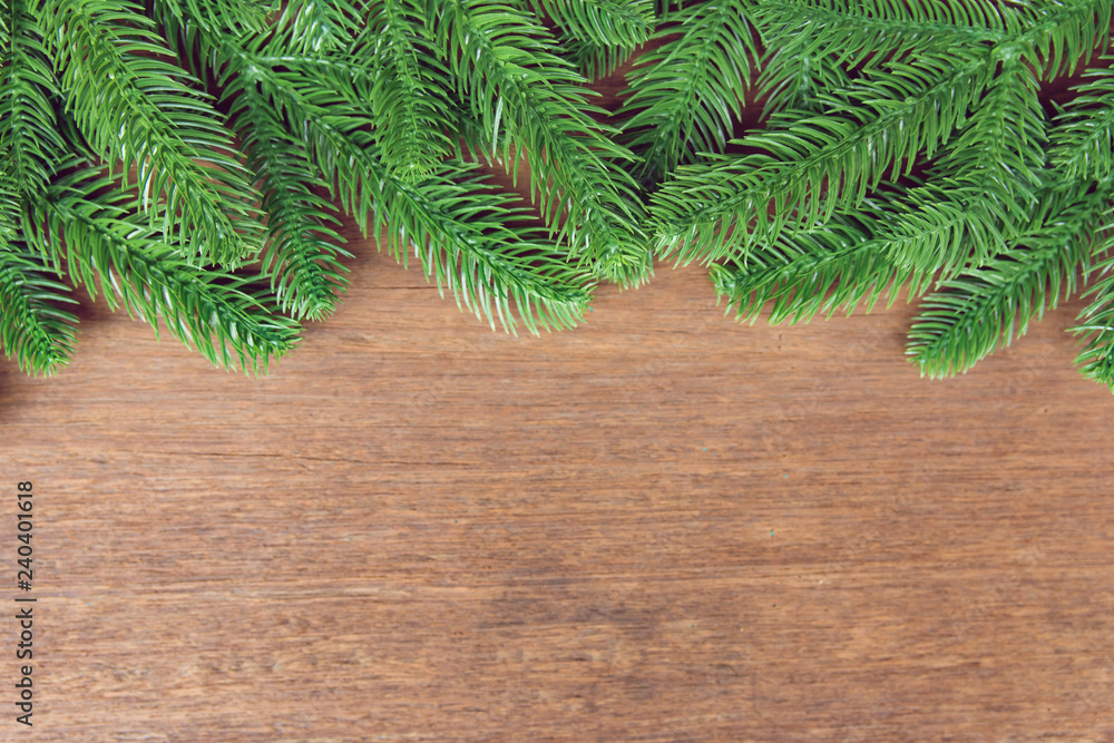 Christmas background. Fir tree branches and with decoration on a wooden board. with copy space for text. Christmas background. Fir tree branches and with decoration on a wooden board. with copy space for text.