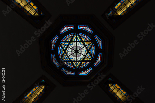jewish star of david light pattern on the ceiling of a synagogue