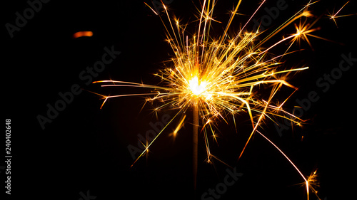 Wallpaper Mural Christmas sparkler isolated on black background. Bengal fire Torontodigital.ca