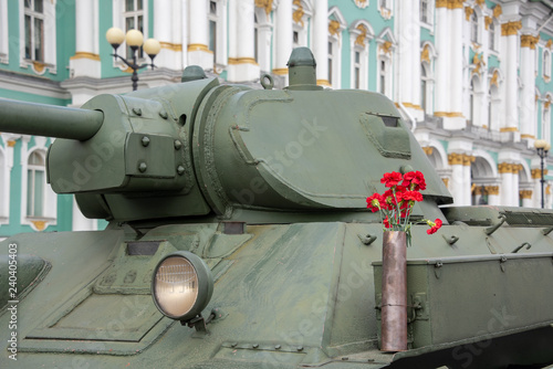 military equipment with carnations