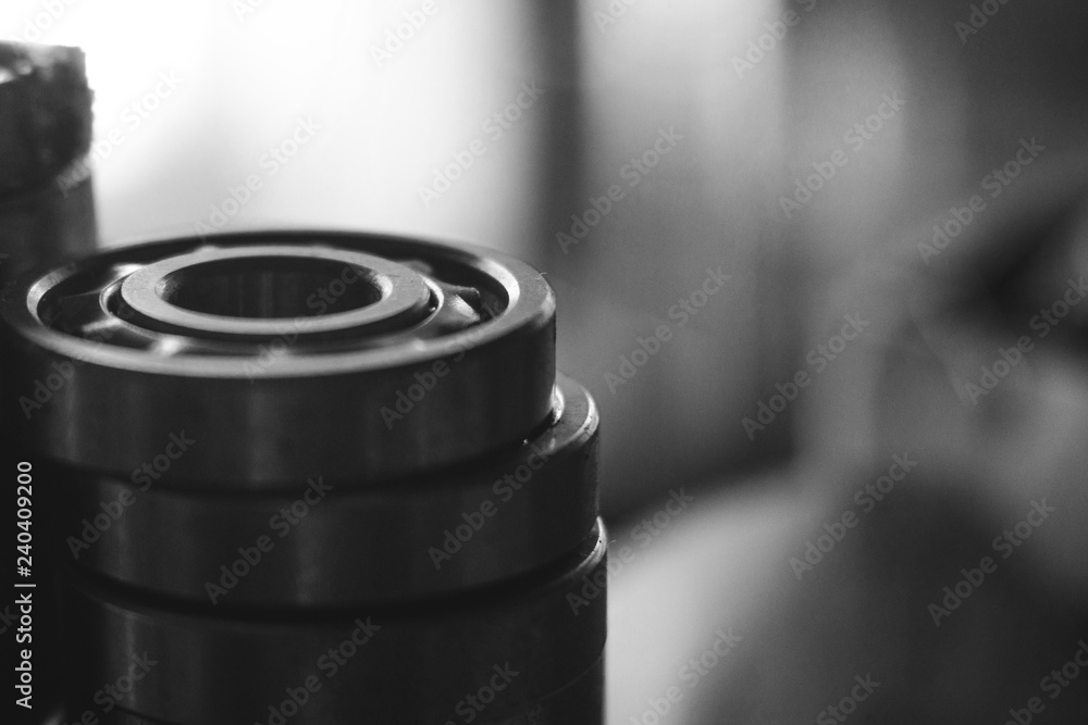 Machinery concept. Set of various gears and ball bearings old and new, BW, black and white Machinery concept. Set of various gears and ball bearings old and new, BW, black and white