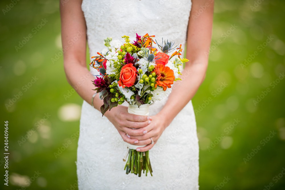 Wedding bride holding a bouquet of flowers Wedding bride holding a bouquet of flowers