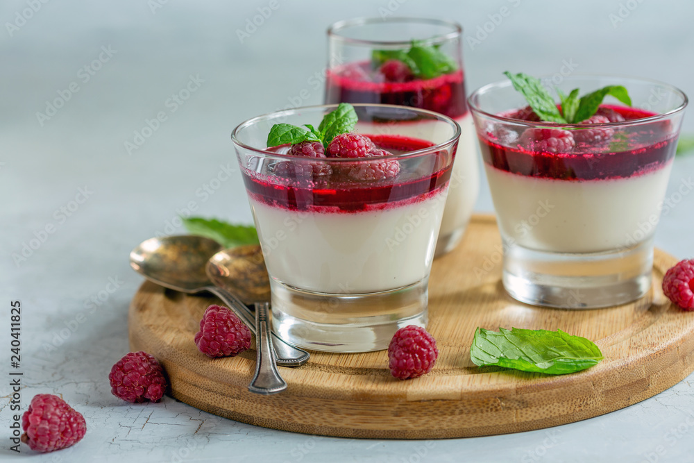 Vanilla Panna cotta with raspberry and mint. Vanilla Panna cotta with raspberry and mint.