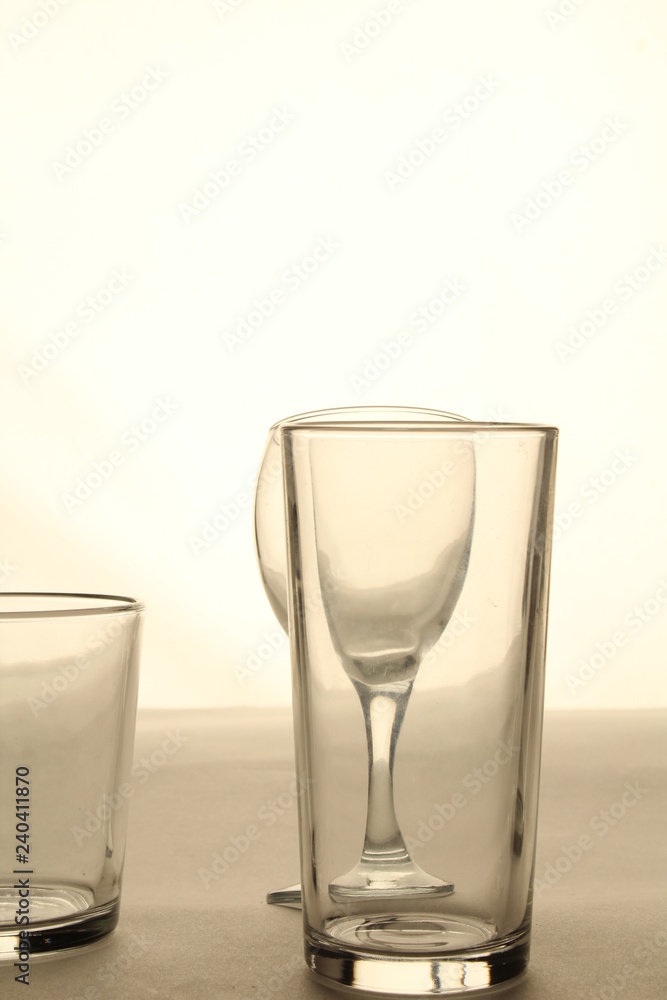 Still life from three transparent glasses on a table Still life from three transparent glasses on a table