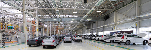 Automotive production line. Long format. Wide angle view of plant of automotive industry. Can be used as a banner