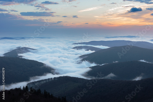 Beautiful sunrise in the Skole Beskydy with fantastic beauty over the sky  and the fog sea around the majestic Carpathian Mountains.