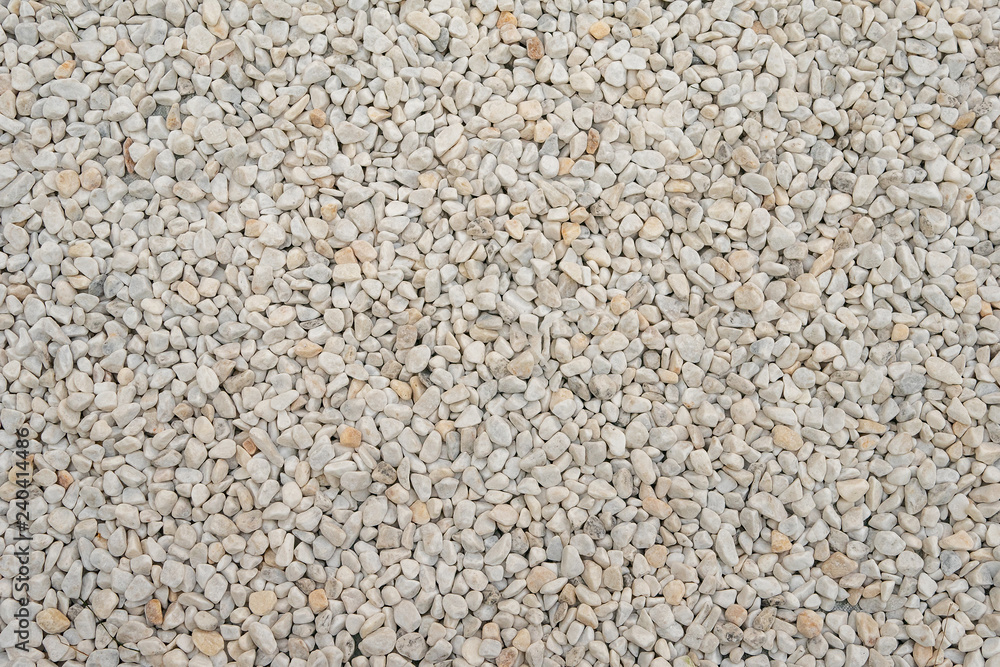 White small rocks or stones surface texture, industrial gravel mineral material, background for design as backdrop White small rocks or stones surface texture, industrial gravel mineral material, background for design as backdrop