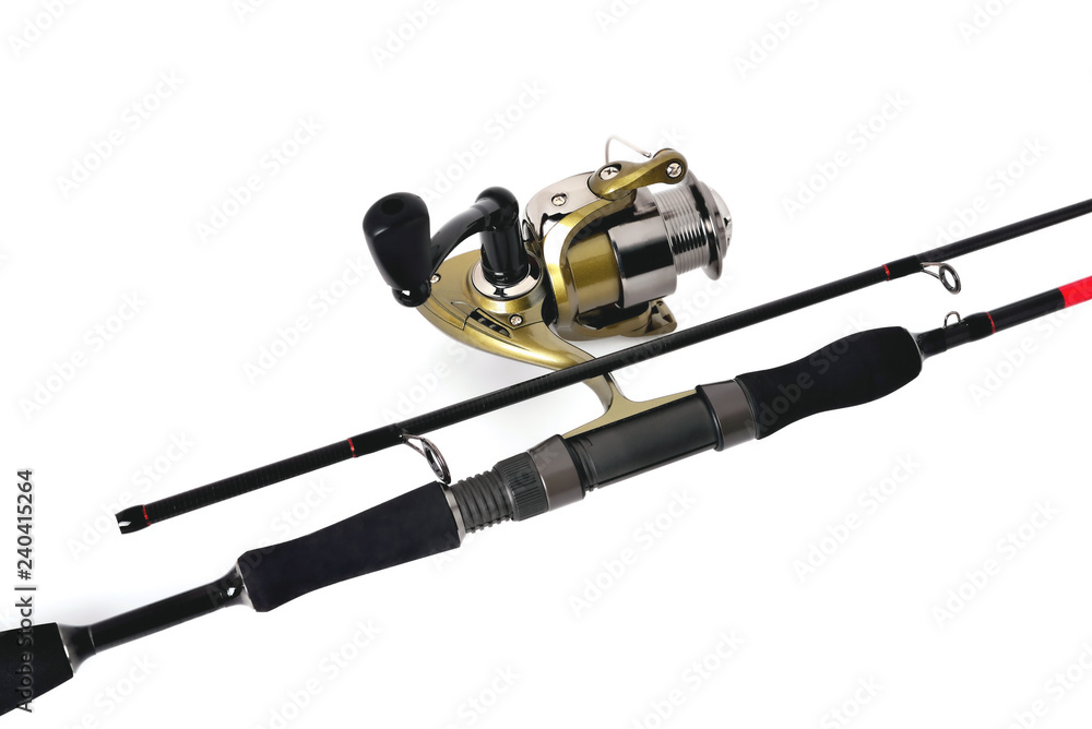 fishing reel on a fishing rod, white background close-up, copy space fishing reel on a fishing rod, white background close-up, copy space