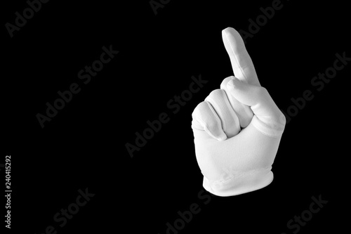 Hand in a white glove on a black background. Gesture eye-catching. Gesticulation.