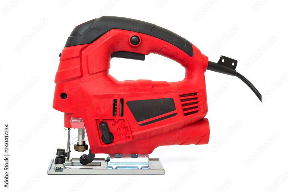 A jigsaw power tool isolated on white background. Electric jig saw. Professional electric jig saw isolated on white background A jigsaw power tool isolated on white background. Electric jig saw. Professional electric jig saw isolated on white background