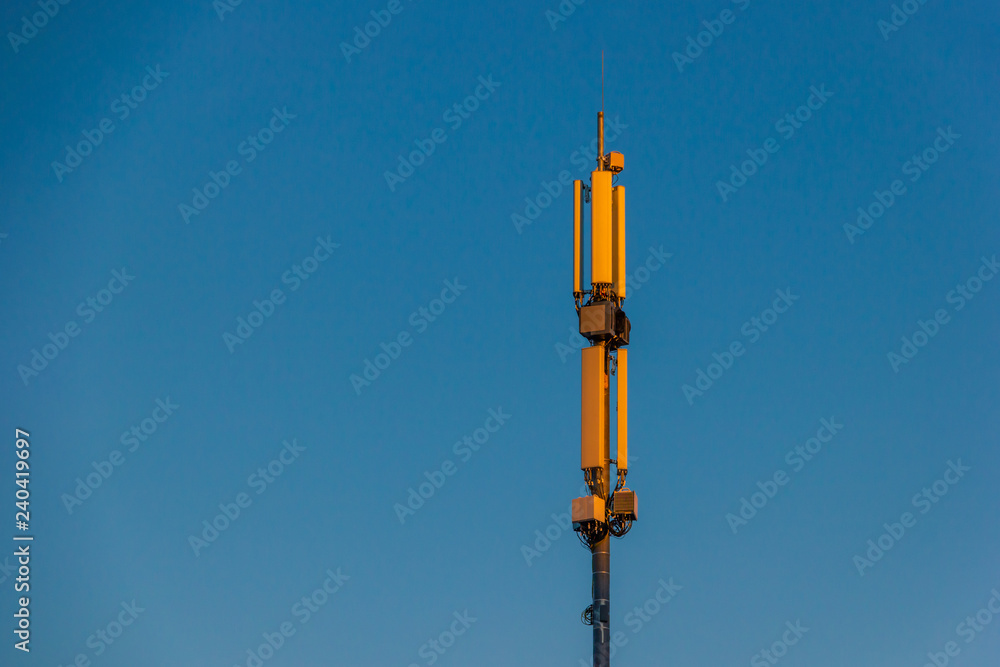 Telecommunication tower Antenna and satellite dish at sunset sky background Telecommunication tower Antenna and satellite dish at sunset sky background