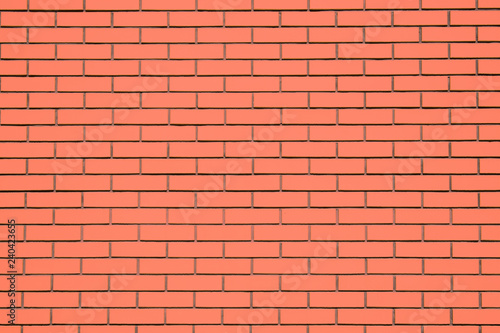 Coral brick wall background. Living Coral textural brick wall, color swatch 