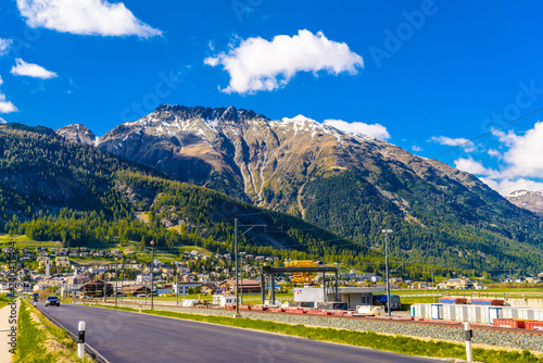 Road with Alps mountains, Samedan, Maloja, Graubuenden, Switzerl