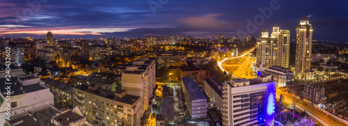 From above night view of Odessa city burning with lights in night time  Ukraine.