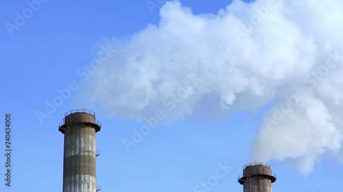 two industrial chimneys