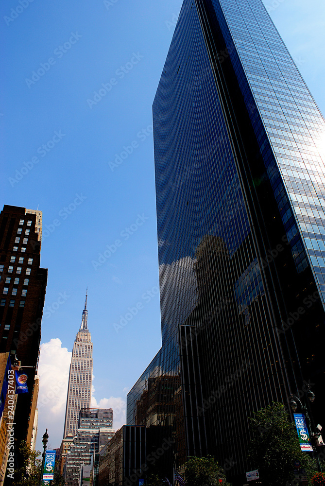 New York, USA - August 14, 2012: Skyscrapers of the city of New York during the summer. New York, USA - August 14, 2012: Skyscrapers of the city of New York during the summer.