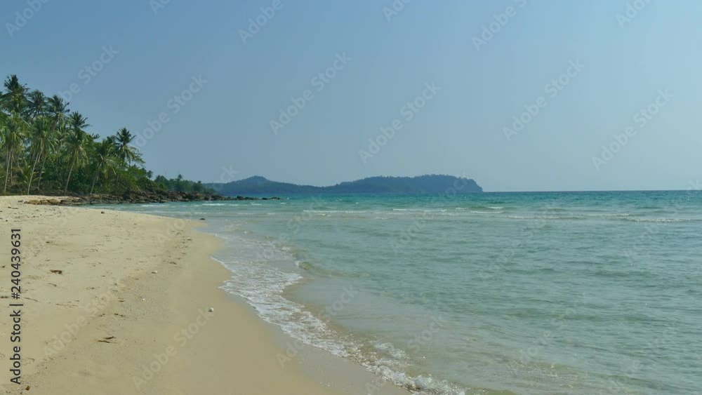 Nature with tropical sea and beach on white cloud and blue sky Nature with tropical sea and beach on white cloud and blue sky