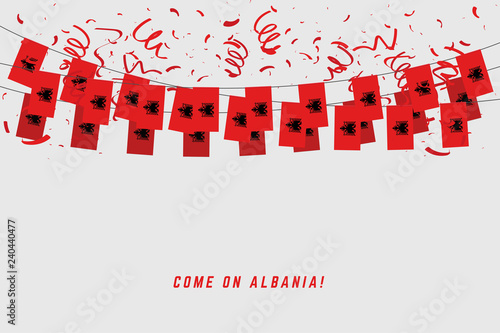 Albania garland flag with confetti on gray background, Hang bunting for Albania celebration template banner.