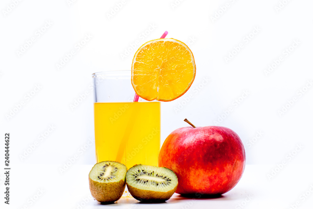 different fruit and juice or smoothie in a glass different fruit and juice or smoothie in a glass