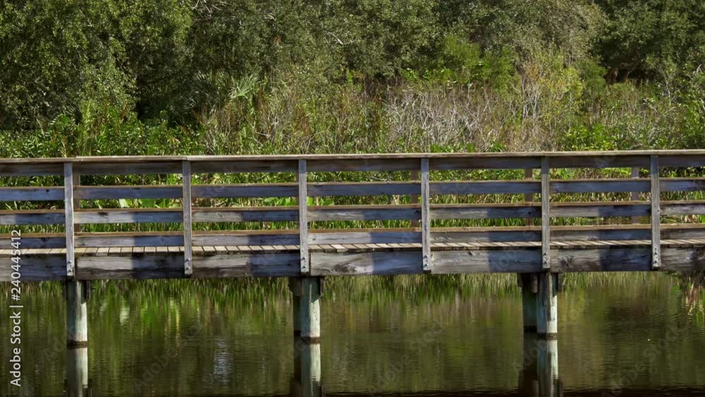 wooden bridge over the river