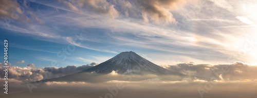 Mountain Fuji in sea of mist or fog at sunrise with cloudy sky, Fujikawaguchiko, Yamanashi, Japan.