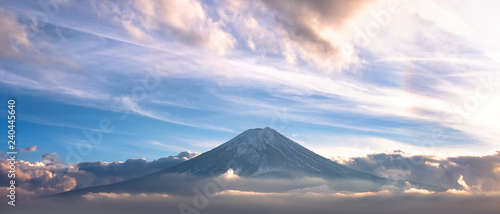 Mountain Fuji in sea of mist or fog at sunrise with cloudy sky, Fujikawaguchiko, Yamanashi, Japan.