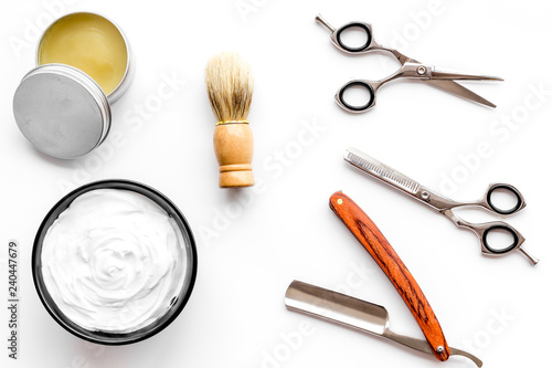 barber workspace in barbershop with equipment white background top view