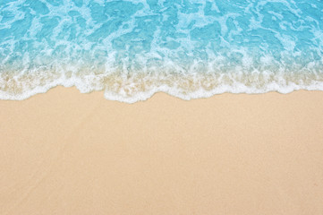 beautiful sandy beach and soft blue ocean wave