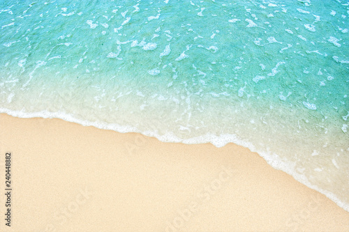 Fototapeta Naklejka Na Ścianę i Meble -  Soft blue ocean wave on clean sandy beach