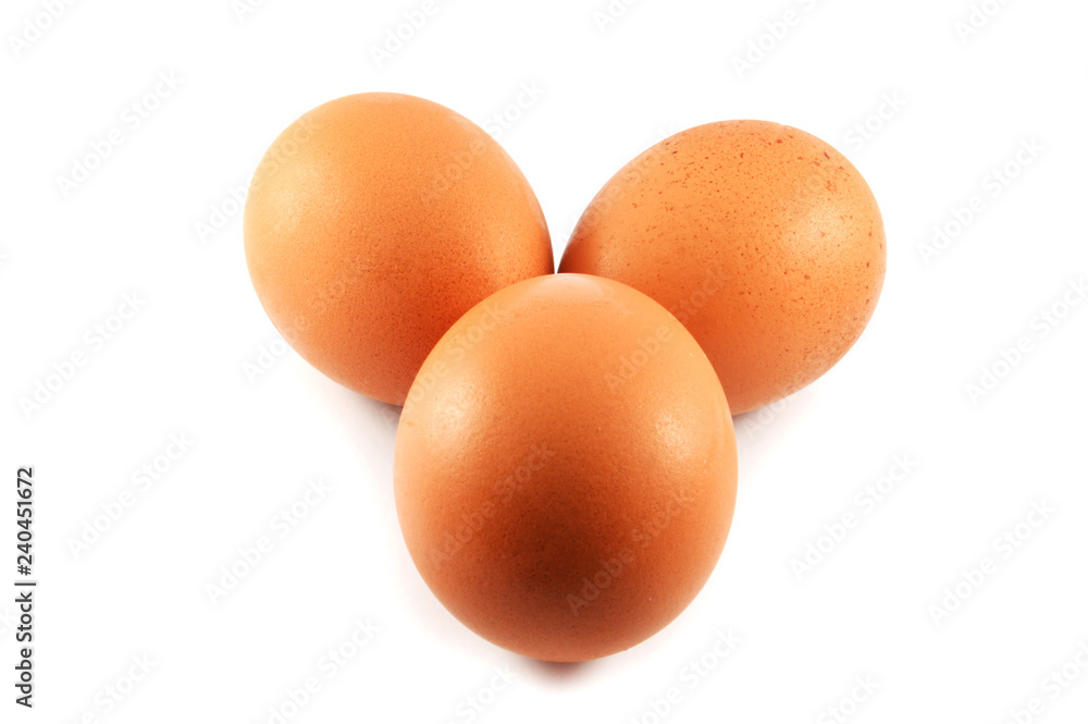 fresh eggs three / egg brown from the farm isolated on white background fresh eggs three / egg brown from the farm isolated on white background