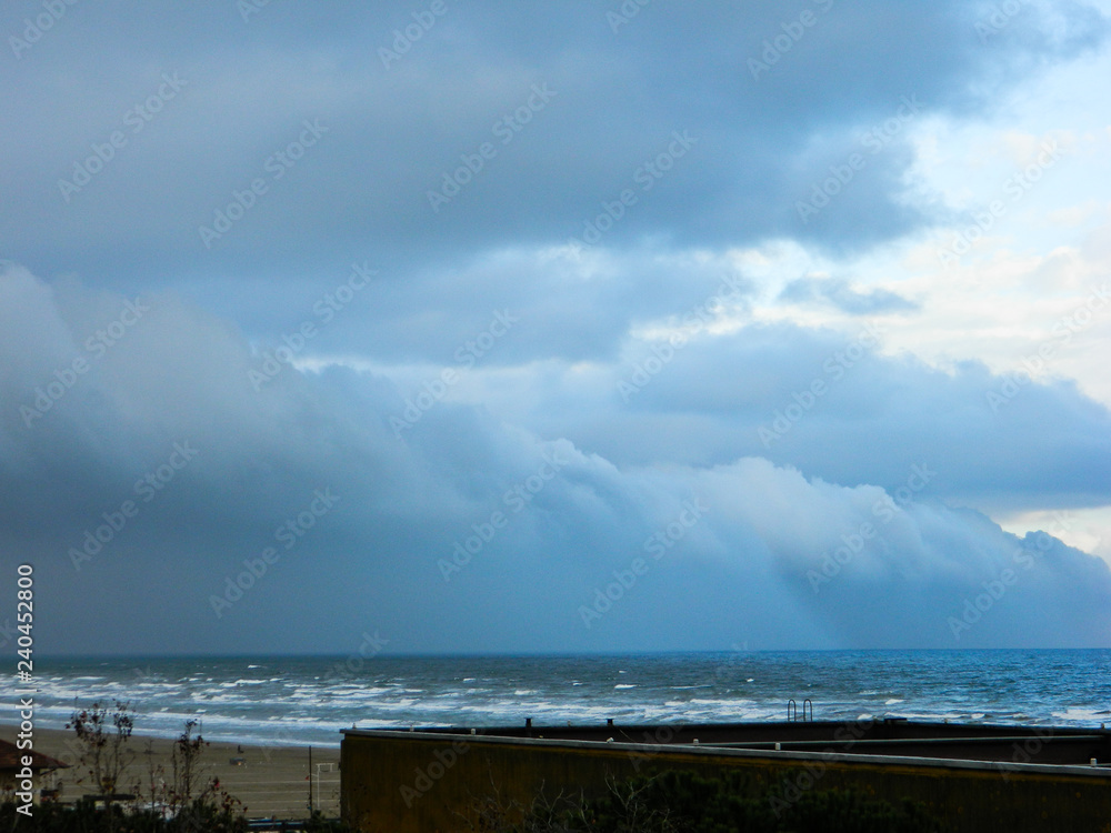 Italy, Mediterranean sea, stormy clouds in Rimini in winter.